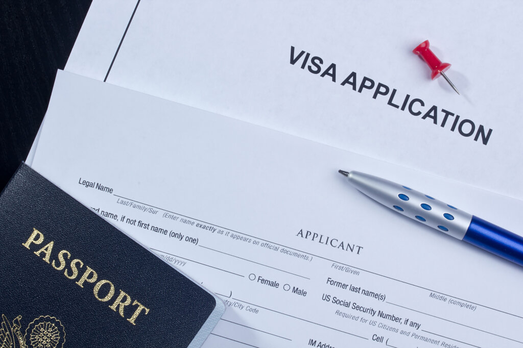 VISA, Immigration and ATAS - passport and other documents on a table