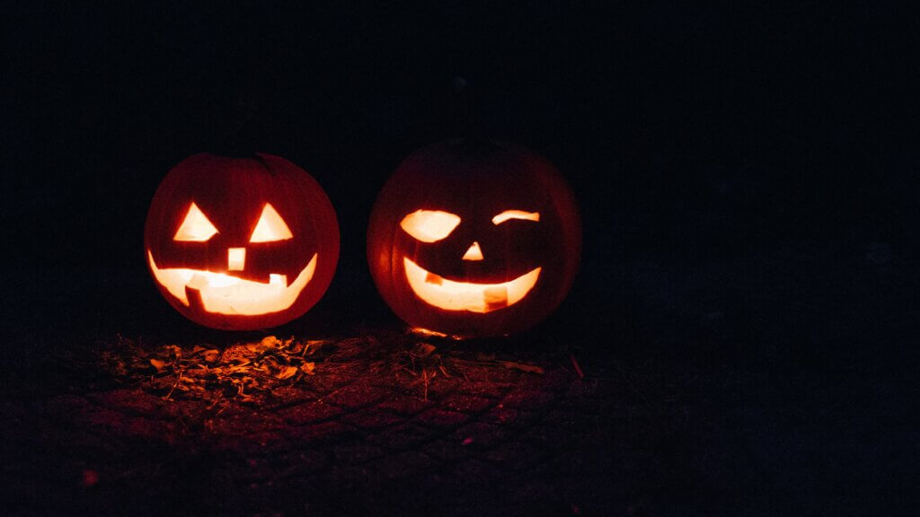 Two Spooky Jack-o'-Lanterns in the Darkness