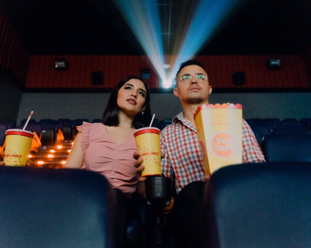 a couple sat in a cinema