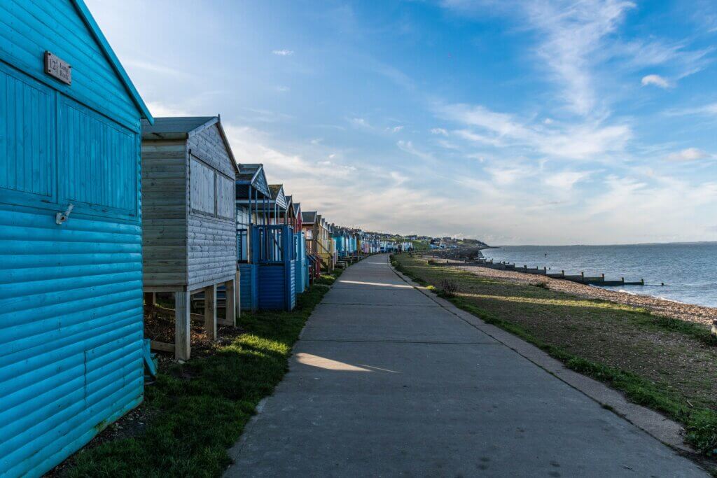 Colourful wooden cabins on Whitstable Beach
