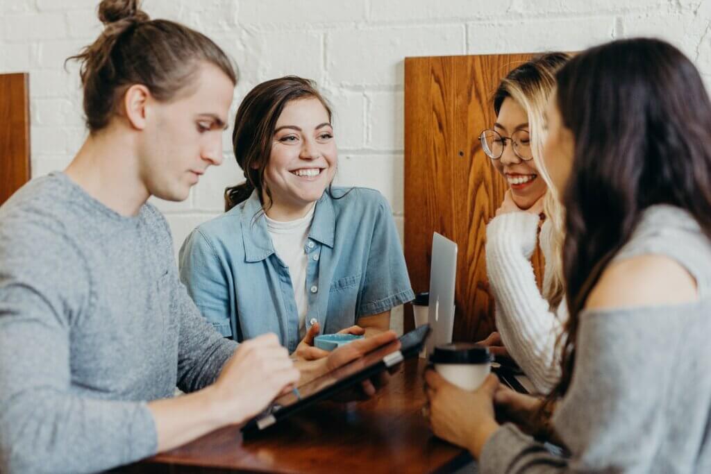 Four People Networking Over a Cup of Tea