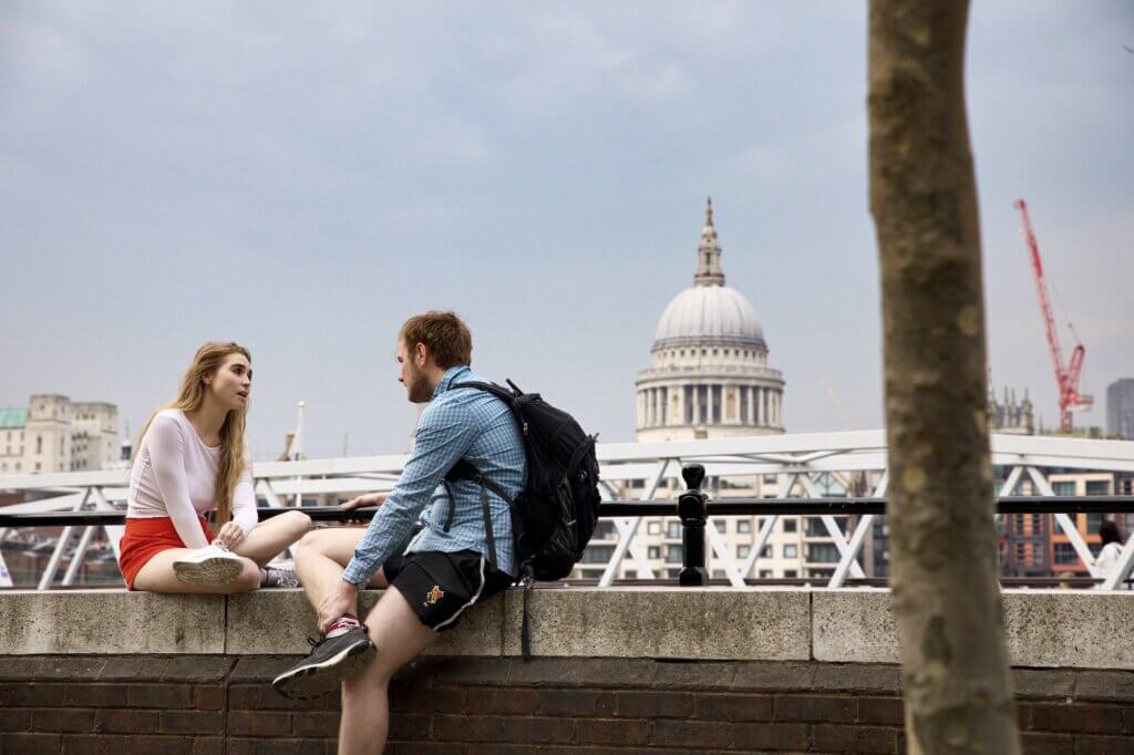 Two students talking while outside St Paul's Cathedral