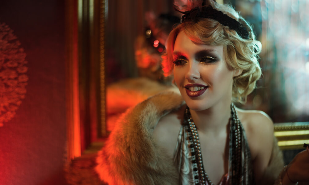 Woman dressed up in flapper girl style clothing, doing something for Valentines Day