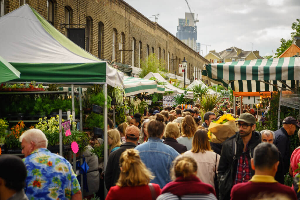 People walking through one of the top 10 east london markets